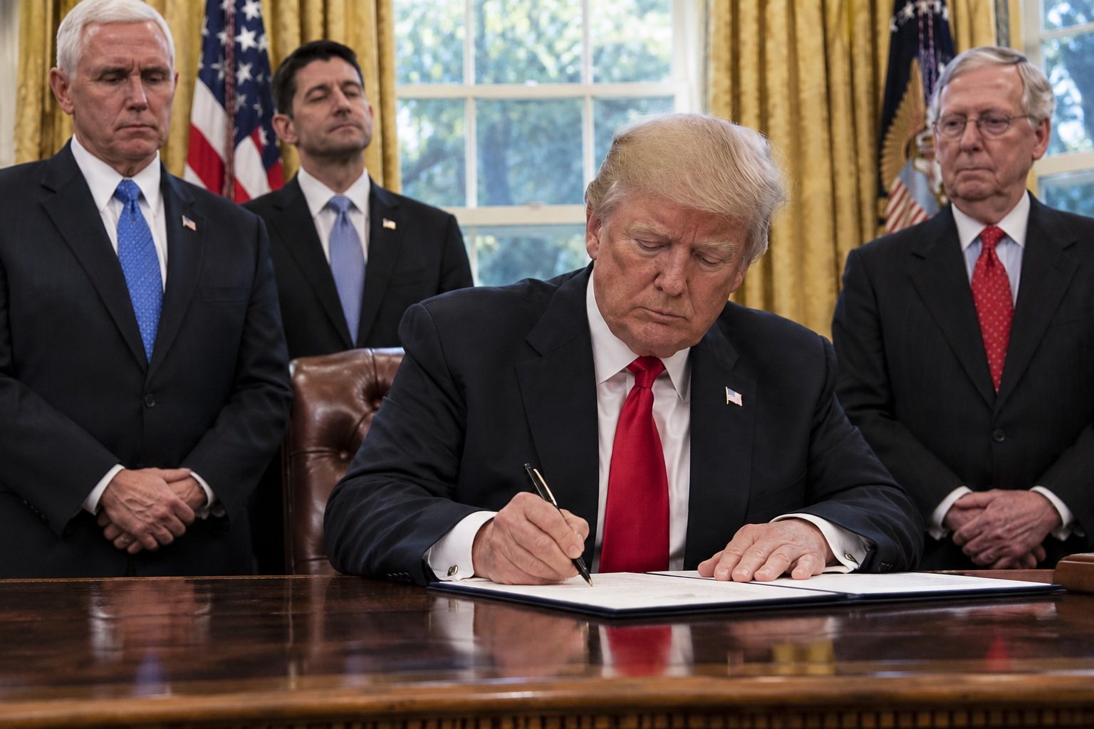 After Congress Failed to Repeal Obamacare, Trump Took Aim at It Himself — article image